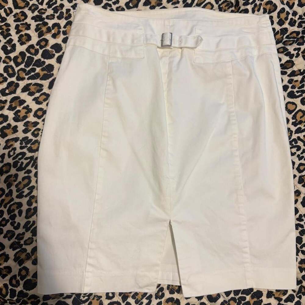 White express pencil skirt with silver buckle detail and slit